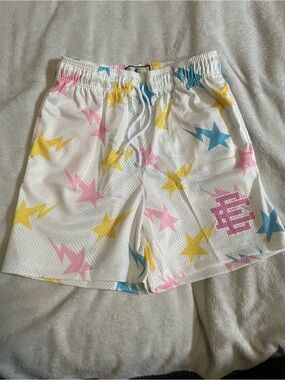 Eric Emanuel x Bape White Mesh Shorts with Pink Yellow & Blue Star Print